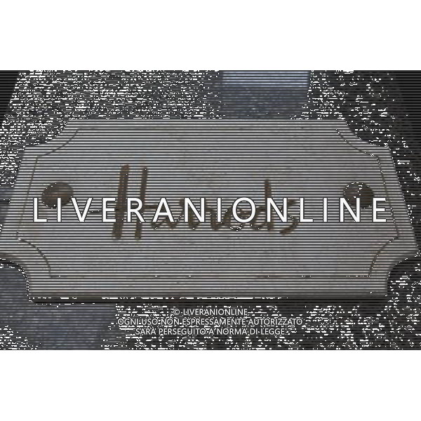Sign for Harrods Department Store, Knightsbridge, London, England AG ALDO LIVERANI SAS ONLY ITALY