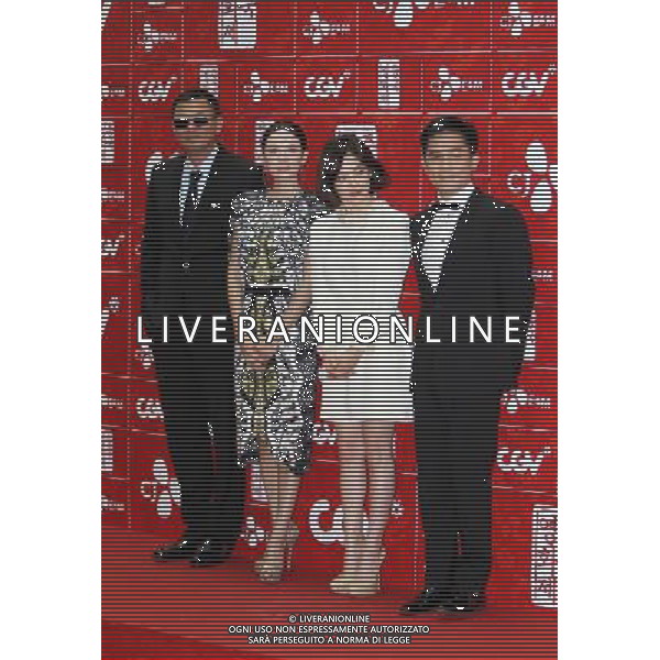 (130616) -- SEOUL, June 16, 2013 () -- (From L to R) Director Wong Kar-wai, actress Zhang Ziyi, actress Song Hye-kyo and actor Tony Leung pose for photos upon their arrival on the red carpet event for 2013 Chinese Film Festival in Seoul, South Korea, June 16, 2013. The 5-day film festival opened in Seoul on Sunday to boost bilateral movie and culture cooperation. Their movie \'The Grandmaster\' has been selected as the opening film at the festival. (/Park Jin-hee)(zhf) ©Photoshot/AGENZIA ALDO LIVERANI SAS-ITALY ONLY - EDITORIAL USE ONLY