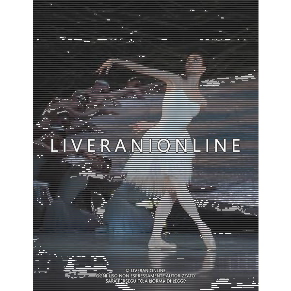 (130620) -- MELBOURNE (AUSTRALIA), June 20, 2013 () -- Dancers from the Australian Ballet perform during a dress rehearsal of Graeme Murphy\'s modern interpretation of \'Swan Lake\' at the Arts Center in Melbourne, Australia, on June 20, 2013. The show, inspired by the love triangle among Princess Diana, Prince Charles and Camilla, will be staged from June 21, 2013. (/Bai Xue) (lr) ©Photoshot/AGENZIA ALDO LIVERANI SAS-ITALY ONLY - EDITORIAL USE ONLY