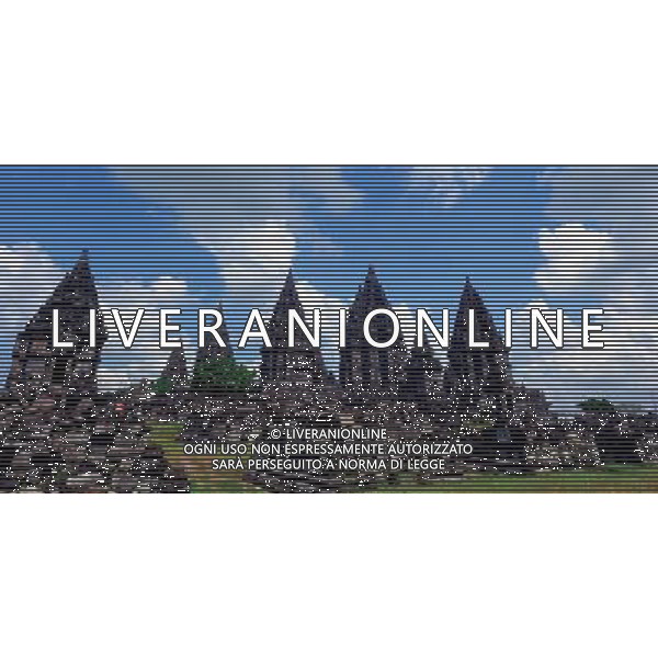 (130621) -- JAKARTA, June 21, 2013 () -- The photo taken on May 16, 2011 shows the Prambanan Temple Compounds in Central Java, Indonesia. Prambanan Temple Compounds is a 9th-century Hindu temple. It is one of the largest Hindu temples in southeast Asia. It was listed as a UNESCO World Heritage Site in 1991. Prambanan Temple Compounds was reconstructed from 1918 but damaged during the May 2006 Java earthquake. It is remarkable for its pointed architecture. The relief panels of its corridors depicts the stories of Indian epic Ramayana. (/Jiang Fan) (dzl) ©Photoshot/AGENZIA ALDO LIVERANI SAS-ITALY ONLY - EDITORIAL USE ONLY