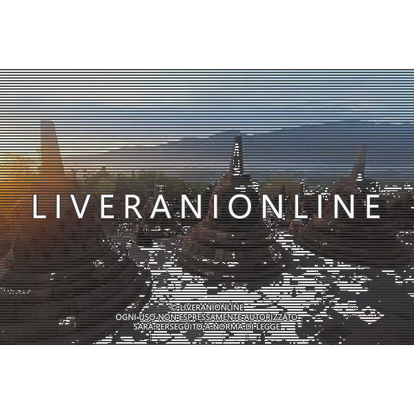 (130621) -- JAKARTA, June 21, 2013 () -- The photo taken on Dec. 20, 2012 shows the Borobudur stupas during sunrise in Central Java, Indonesia. Borobudur is a 9th-century Mahayana Buddhist Temple. It was listed as a UNESCO World Heritage Site in 1991 and confirmed as the largest temple in the world by the Guiness World Records in 2012. (/Jiang Fan) (dzl) ©Photoshot/AGENZIA ALDO LIVERANI SAS-ITALY ONLY - EDITORIAL USE ONLY