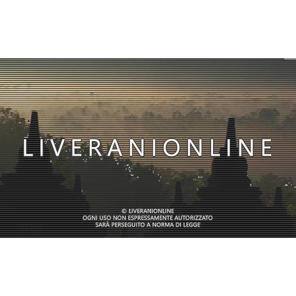 (130621) -- JAKARTA, June 21, 2013 () -- The photo taken on Dec. 20, 2012 shows the Borobudur stupas in Central Java, Indonesia. Borobudur is a 9th-century Mahayana Buddhist Temple. It was listed as a UNESCO World Heritage Site in 1991 and confirmed as the largest temple in the world by the Guiness World Records in 2012. (/Jiang Fan) (dzl) ©Photoshot/AGENZIA ALDO LIVERANI SAS-ITALY ONLY - EDITORIAL USE ONLY