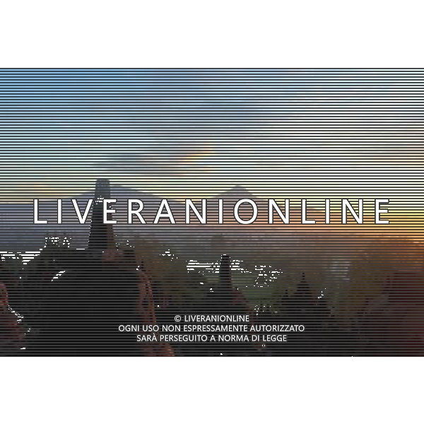 (130621) -- JAKARTA, June 21, 2013 () -- The photo taken on Dec. 20, 2012 shows the Borobudur stupas in Central Java, Indonesia. Borobudur is a 9th-century Mahayana Buddhist Temple. It was listed as a UNESCO World Heritage Site in 1991 and confirmed as the largest temple in the world by the Guiness World Records in 2012. (/Jiang Fan) (dzl) ©Photoshot/AGENZIA ALDO LIVERANI SAS-ITALY ONLY - EDITORIAL USE ONLY