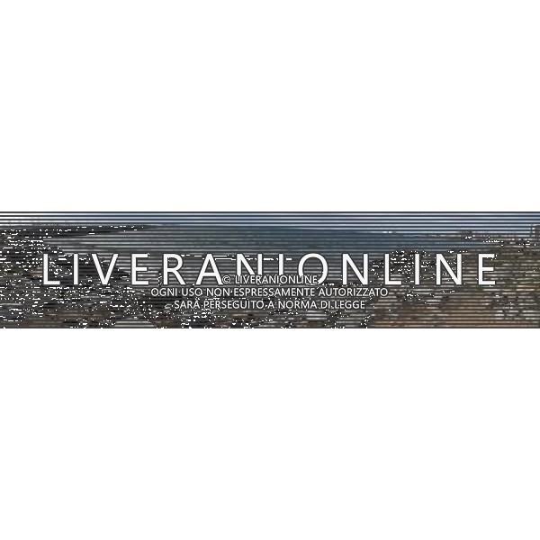 (130625) -- FORTALEZA, June 25, 2013 () -- Image taken with a digital panoromic camera shows women walking on a beach in the city of Fortaleza, Brazil. Fortaleza is one of the six host cities for the FIFA Confederations Brazil 2013 and will witness the semifinal between Spain and Italy on June 27, 2013. (/Guillermo Arias) (fnc) (sp) AG ALDO LIVERANI SAS ONLY ITALY