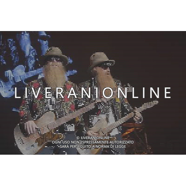 ZZ Top performing at Manchester Apollo on 25th June 2013. L-R: Dusty Hill, bass/vocals and Billy Gibbons lead guitar/vocals. ©photohsot/AGENZIA ALDO LIVERANI SAS - ITALY ONLY - EDITORIAL USE ONLY