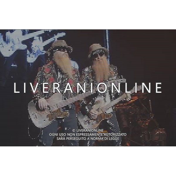 ZZ Top performing at Manchester Apollo on 25th June 2013. L-R: Dusty Hill, bass/vocals and Billy Gibbons lead guitar/vocals. ©photohsot/AGENZIA ALDO LIVERANI SAS - ITALY ONLY - EDITORIAL USE ONLY