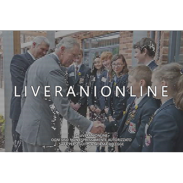  Re. The Prince of Wales as Patron of Marie Curie Cancer Care opens the Marie Curie Hospice in Solihull, Birmingham (21 June 2013). - Pictured meeting children from Solihull School. ©photoshot/AGENZIA ALDO LIVERANI SAS - ITALY ONLY - REALI INGLESI: Il Principe Carlo d\'Inghilterra