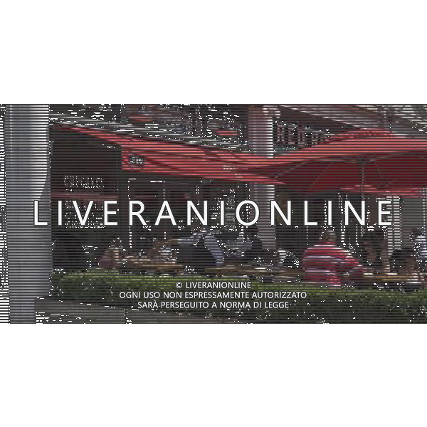 Patrons sit at the outdoor cafe of the XXXXX restaurant on Lenox Avenue in the neighborhood of Harlem in New York on Sunday, June 23, 2013. Wide sidewalks and a renaissance in Harlem have caused a number of restaurants to open catering to the more upwardly mobile newer residents. (Œ Richard B. Levine) ©photoshot/AGENZIA ALDO LIVERANI SAS - ITALY ONLY - Veduta della vita quotidiana e commerciale dei quartieri della citta\' di New York