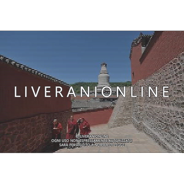(130627) -- MOUNT WUTAI, June 27, 2013 () -- Monks walk to the Luohou Temple on Mount Wutai, one of four sacred Buddhist mountains in China, in north China\'s Shanxi Province, June 26, 2013. Added to UNESCO\'s World Heritage List in 2009, Mount Wutai is home to about 50 Buddhist temples built between the 1st century AD and the early 20th century. (/Zhan Yan) (ry) ag aldo liverani sas only italy