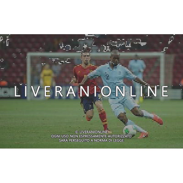 (130628) -- ISTANBUL, June 27, 2013 () -- France\'s Foulquier (R) vies for the ball with Alcacer of Spain during the FIFA U-20 World Cup Turkey 2013 semifinal match in Istanbul, Turkey, on June 27, 2013. Spain won 2-1. (/Lu Zhe) ©PHOTOSHOT/AGENZIA ALDO LIVERANI SAS - ITALY ONLY - Francia- Spagna Campionati mondiali calcio FIFA U20 World Cup semifinale a Istanbul, in Turchia, il 27 giugno 2013. La Spagna ha vinto 2-1.