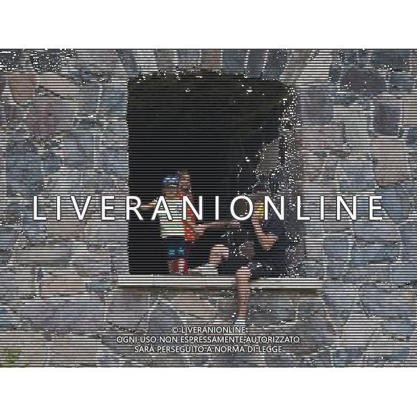 (130628) -- HELSINKI, June 28, 2013() -- People play on a wall of the island fortress of Suomenlinna in Helsinki, capital of Finland, on June 24, 2013. Fortress of Suomenlinna is a unique historical monument and one of the largest maritime fortresses in the world. Its construction began in 1700s when Finland was part of the Kingdom of Sweden. As an example of European military architecture of its time, Suomenlinna was included in UNESCO\'s World Heritage List in 1991. (/Yan Ting) AG ALDO LIVERANI SAS ONLY ITALY