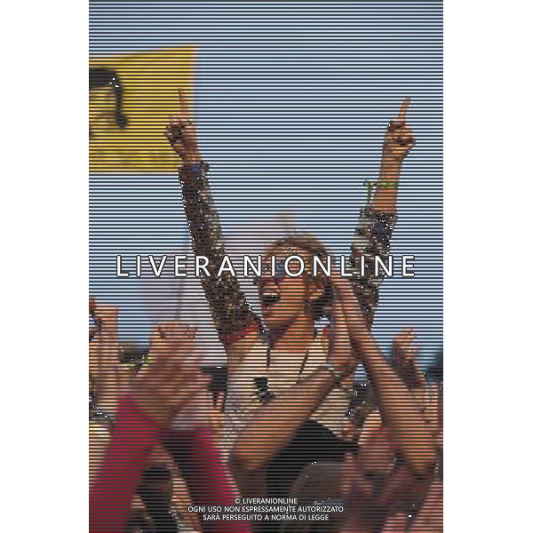 Atmosphere at Glastonbury Festival on 28/06/2013 at Worthy Farm, Glastonbury. Women and girls on shoulders in the crowd. ©PHOTOSHOT/AGENZIA ALDO LIVERANI SAS - ITALY ONLY - EDITORIAL USE ONLY