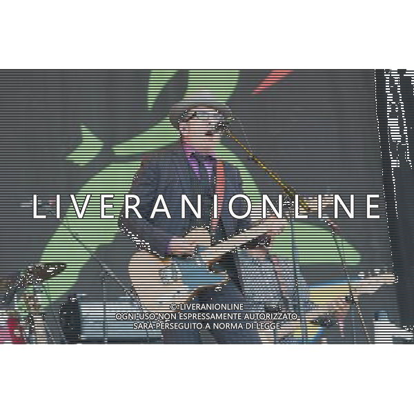 Elvis Costello (born Declan Patrick MacManus) performs on the Pyramid Stage at Glastonbury Festival, Worthy Farm, Pilton, Glastonbury, Somerset, UK on 29th June 2013. ©PHOTOSHOT/AGENZIA ALDO LIVERANI SAS - ITALY ONLY - EDITORIAL USE ONLY