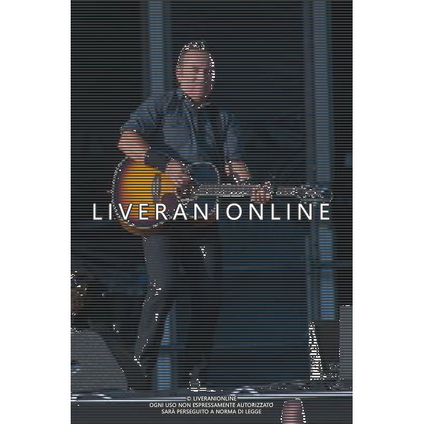 Bruce Springsteen \' The E Street Band on their The Wrecking Ball Tour - Bruce Springsteen â€“ lead vocals, lead, rhythm, and acoustic guitar, harmonica, piano, Patti Scialfa â€“ backing and duet vocals, acoustic guitar, percussion, Garry Tallent â€“ bass guitar, tuba, backing vocals, Roy Bittan â€“ piano, keyboards, accordion, Max Weinberg â€“ drums, percussion, Steven Van Zandt â€“ lead and rhythm guitar, backing vocals, mandolin, Nils Lofgren â€“ lead and rhythm guitar, pedal steel guitar, backing vocals, Soozie Tyrell â€“ violin, acoustic guitar, percussion, backing vocals, Charles Giordano â€“ organ, accordion, glockenspiel, performing live in concert at ive at Hard Rock Calling 2013 on the Main Stage, Queen Elizabeth Olympic Park, London, United Kingdom Date: 29/06/2013 ©photoshot/AGENZIA ALDO LIVERANI SAS - ITALY ONLY - EDITORIAL USE ONLY