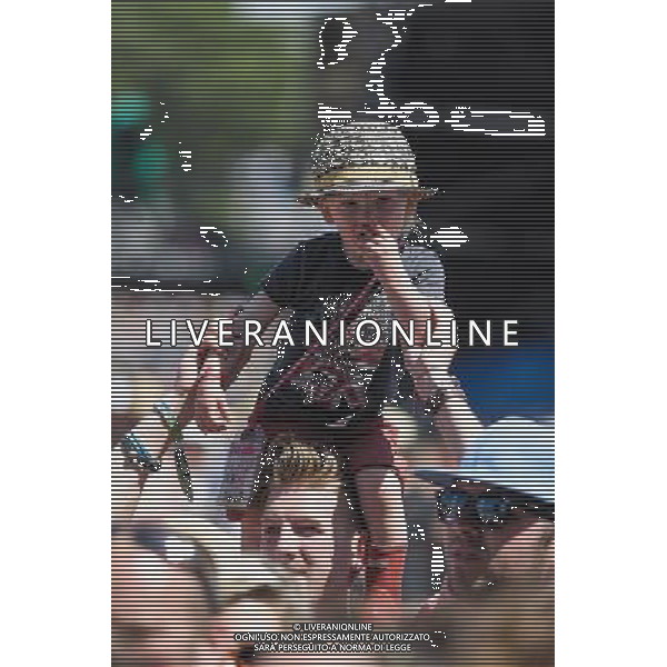 Atmosphere at Glastonbury Festival on 29/06/2013 at Worthy Farm, Glastonbury. A young boy on shoulders. ©photoshot/AGENZIA ALDO LIVERANI SAS - ITALY ONLY - EDITORIAL USE ONLY