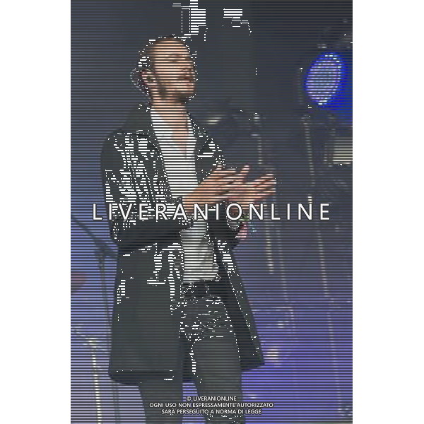 Birmingham band Editors perform on The Other Stage at Glastonbury Festival, Worthy Farm, Pilton, Glastonbury, Somerset, UK on 30th June 2013. The band consists of Tom Smith (lead vocals, guitar, piano), Russell Leetch (bass guitar, synthesizer, backing vocals), Ed Lay (drums, percussion, backing vocals), Justin Lockey (Lead guitar), and Elliott Williams (Keys, synthesizers, guitars, and backing vocals). ©Photoshot/AGENZIA ALDO LIVERANI SAS-ITALY ONLY - EDITORIAL USE ONLY