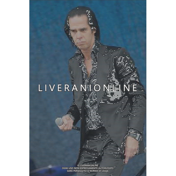 Nick Cave And The Bad Seeds perform on The Pyramid Stage at Glastonbury Festival, Worthy Farm, Pilton, Glastonbury, Somerset, UK on 30th June 2013. Pictured: Nick Cave ©Photoshot/AGENZIA ALDO LIVERANI SAS-ITALY ONLY - EDITORIAL USE ONLY