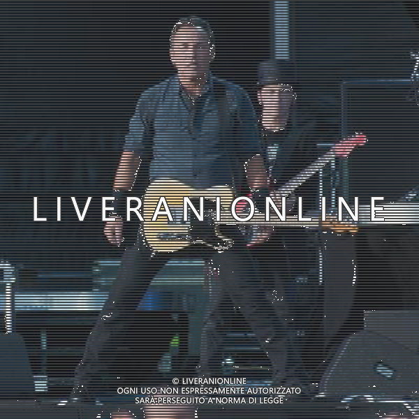 Bruce Springsteen \' The E Street Band on their The Wrecking Ball Tour - Bruce Springsteen- lead vocals, lead, rhythm, and acoustic guitar, harmonica, piano, lNils Lofgren- lead and rhythm guitar, pedal steel guitar, backing vocals, performing live in concert at live at Hard Rock Calling 2013 on the Main Stage, Queen Elizabeth Olympic Park, London, United Kingdom Date: 30/06/2013 ©Photoshot/AGENZIA ALDO LIVERANI SAS-ITALY ONLY - EDITORIAL USE ONLY