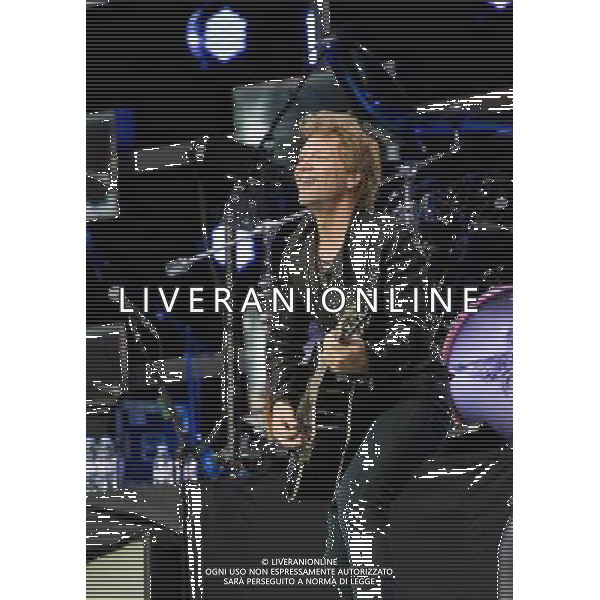 - Pictured is: Singer and guitarist Jon Bon Jovi and Bon Jovi performing live as part of their \'Because We Can Tour\' at Hampden Stadium, Glasgow, Scotland, UK. 3rd July 2013. AG ALDO LIVERANI SAS ONLY ITALY