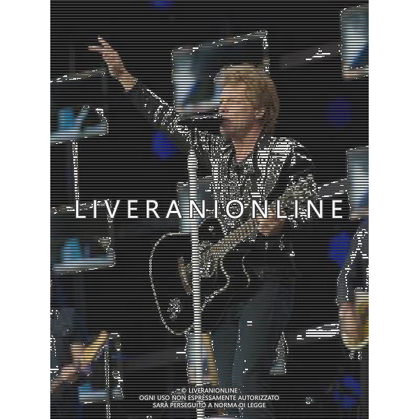 - Pictured is: Singer and guitarist Jon Bon Jovi and Bon Jovi performing live as part of their \'Because We Can Tour\' at Hampden Stadium, Glasgow, Scotland, UK. 3rd July 2013. AG ALDO LIVERANI SAS ONLY ITALY