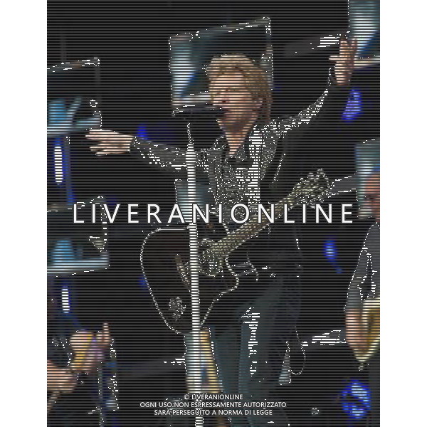 - Pictured is: Singer and guitarist Jon Bon Jovi and Bon Jovi performing live as part of their \'Because We Can Tour\' at Hampden Stadium, Glasgow, Scotland, UK. 3rd July 2013. AG ALDO LIVERANI SAS ONLY ITALY