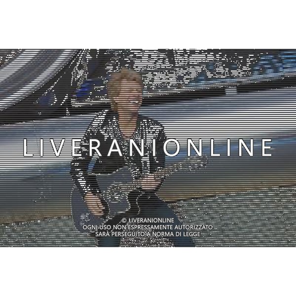 - Pictured is: Singer and guitarist Jon Bon Jovi and Bon Jovi performing live as part of their \'Because We Can Tour\' at Hampden Stadium, Glasgow, Scotland, UK. 3rd July 2013. AG ALDO LIVERANI SAS ONLY ITALY