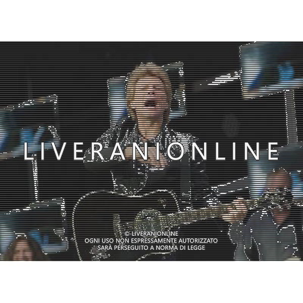 - Pictured is: Singer and guitarist Jon Bon Jovi and Bon Jovi performing live as part of their \'Because We Can Tour\' at Hampden Stadium, Glasgow, Scotland, UK. 3rd July 2013. AG ALDO LIVERANI SAS ONLY ITALY