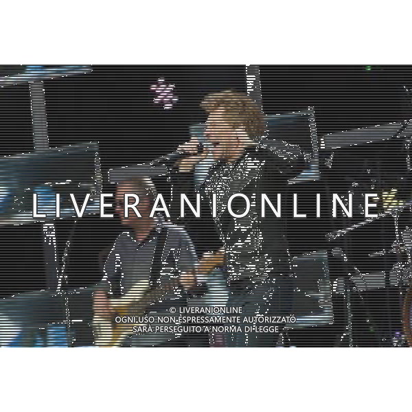 - Pictured is: Singer and guitarist Jon Bon Jovi and Bon Jovi performing live as part of their \'Because We Can Tour\' at Hampden Stadium, Glasgow, Scotland, UK. 3rd July 2013. AG ALDO LIVERANI SAS ONLY ITALY