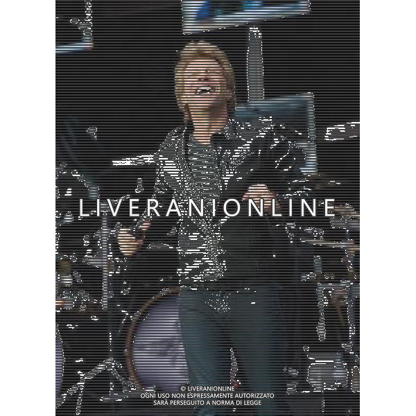 - Pictured is: Singer and guitarist Jon Bon Jovi and Bon Jovi performing live as part of their \'Because We Can Tour\' at Hampden Stadium, Glasgow, Scotland, UK. 3rd July 2013. AG ALDO LIVERANI SAS ONLY ITALY