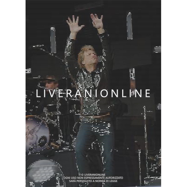 - Pictured is: Singer and guitarist Jon Bon Jovi and Bon Jovi performing live as part of their \'Because We Can Tour\' at Hampden Stadium, Glasgow, Scotland, UK. 3rd July 2013. AG ALDO LIVERANI SAS ONLY ITALY