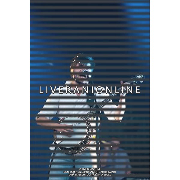 Mumford and Sons headline a one day festival, Gentlemen of the Road, at the Queen Elizabeth Park in Stratford. The show was part of their Summer Stampede 2013 tour. Picture shows Winston Marshall. AG ALDO LIVERANI SAS ONLY ITALY