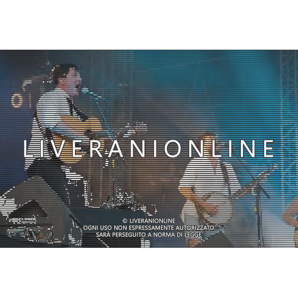 Mumford and Sons headline a one day festival, Gentlemen of the Road, at the Queen Elizabeth Park in Stratford. The show was part of their Summer Stampede 2013 tour. Picture shows Marcus Mumford and Winston Marshall. AG ALDO LIVERANI SAS ONLY ITALY