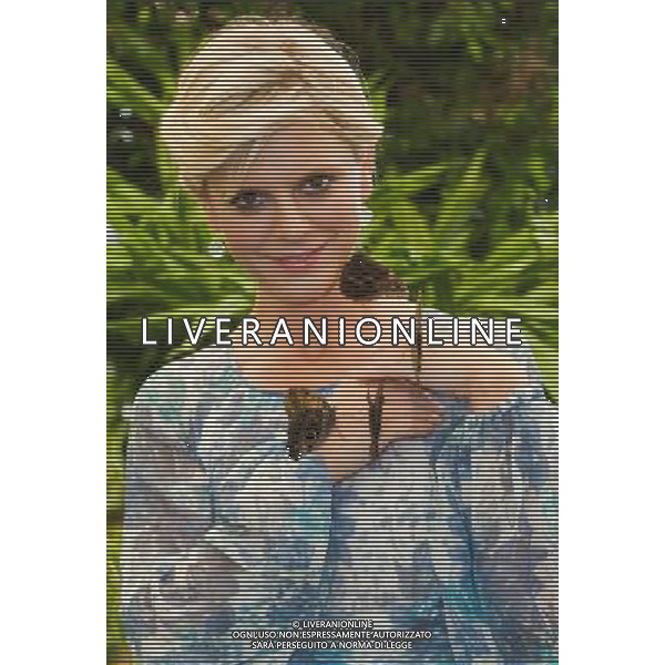 Emilia Fox, holding Butterfly\'s in the RHS Butterfly Dome with Eden at the RHS Hampton Court Flower Show, Middlesex, England. 8-7-13