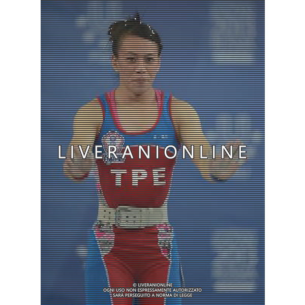 (130709) -- KAZAN, July 9, 2013 () -- Kuo Hsing-chun of Chinese Taipei reacts after winning the women\'s 58kg final of weightlifting event at the 27th Summer Universiade at the Ak Bure Multipurpose Sports Complex in Kazan, Russia, July 8, 2013. Kuo Hsing-chun won the gold medal and created the new Universiade record of the event with 238kg. She also created the new universiade snatch and clean \' jerk records with 104kg and 134kg. (/Kong Hui) ©PHOTOSHOT/AGENZIA ALDO LIVERANI SAS - ITALY ONLY - EDITORIAL USE ONLY