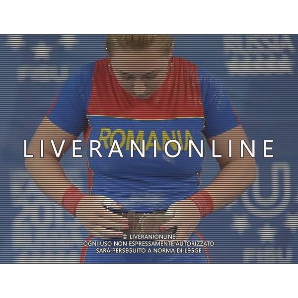 (130709) -- KAZAN, July 9, 2013 () -- Georgiana Andreea Tites of Romania competes during the women\'s 58kg final of weightlifting event at the 27th Summer Universiade at the Ak Bure Multipurpose Sports Complex in Kazan, Russia, July 8, 2013. Georgiana Andreea Tites took the 11th place with 171kg. (/Kong Hui) ©PHOTOSHOT/AGENZIA ALDO LIVERANI SAS - ITALY ONLY - EDITORIAL USE ONLY