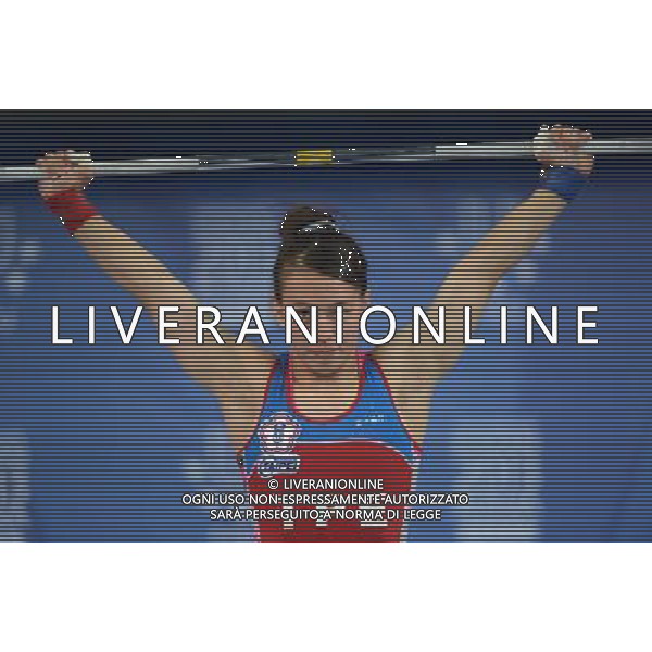 (130709) -- KAZAN, July 9, 2013 () -- Kuo Hsing-chun of Chinese Taipei competes during the women\'s 58kg final of weightlifting event at the 27th Summer Universiade at the Ak Bure Multipurpose Sports Complex in Kazan, Russia, July 8, 2013. Kuo Hsing-chun won the gold medal and created the new Universiade record of the event with 238kg. She also created the new universiade snatch and clean \' jerk records with 104kg and 134kg. (/Kong Hui) ©PHOTOSHOT/AGENZIA ALDO LIVERANI SAS - ITALY ONLY - EDITORIAL USE ONLY