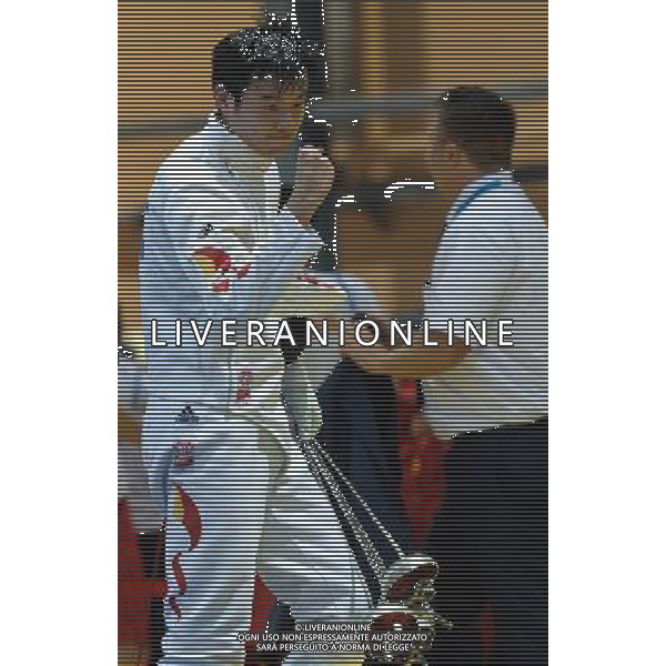 (130709) -- KAZAN, July 9, 2013 () -- China\'s Dong Chao celebrates victory after the Men\'s Epee Individual Finals at the 27th Summer Universiade in Kazan, Russia, July 8, 2013. Dong claimed the title by defeating Kazakhstan\'s Ruslan Kurbanov with 15-10. (/Jiang Kehong) ©PHOTOSHOT/AGENZIA ALDO LIVERANI SAS - ITALY ONLY - EDITORIAL USE ONLY