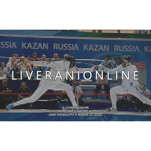 (130709) -- KAZAN, July 9, 2013 () -- China\'s Dong Chao (L) competes during the Men\'s Epee Individual Finals at the 27th Summer Universiade in Kazan, Russia, July 8, 2013. Dong claimed the title by defeating Kazakhstan\'s Ruslan Kurbanov with 15-10. (/Jiang Kehong) ©PHOTOSHOT/AGENZIA ALDO LIVERANI SAS - ITALY ONLY - EDITORIAL USE ONLY