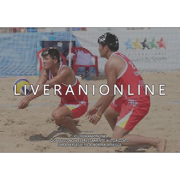 (130709) -- KAZAN, July 9, 2013 () -- China\'s Lin Minggui (L) and Wang Dafa compete during the men\'s beach volleyball match against Al Belushi Hassan and Al Subhi Faisal of Oman at the 27th Summer Universiade in Kazan, Russia, July 9, 2013. Lin Minggui and Wang Dafa lost 0-2. (/Meng Yongmin) ©PHOTOSHOT/AGENZIA ALDO LIVERANI SAS - ITALY ONLY - EDITORIAL USE ONLY