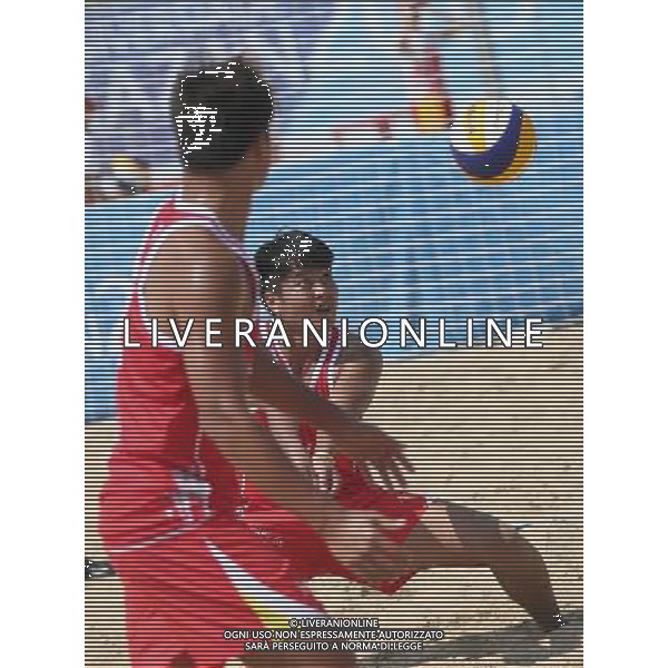 (130709) -- KAZAN, July 9, 2013 () -- China\'s Wang Dafa (R) and Lin Minggui compete during the men\'s beach volleyball match against Al Belushi Hassan and Al Subhi Faisal of Oman at the 27th Summer Universiade in Kazan, Russia, July 9, 2013. Lin Minggui and Wang Dafa lost 0-2. (/Meng Yongmin) ©PHOTOSHOT/AGENZIA ALDO LIVERANI SAS - ITALY ONLY - EDITORIAL USE ONLY