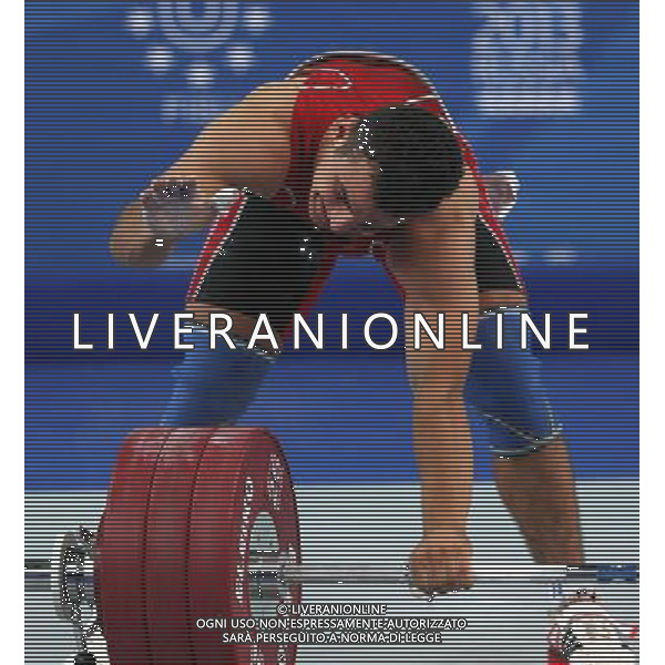(130710) -- KAZAN, July 10, 2013 () -- Firidun Guliyev of Azerbaijan celebrates victory during the men\'s 69kg weightlifting final at the 27th Summer Universiade in Kazan Russia, July 9, 2013. Guliyev achieved the gold medal with 323kg in total. (/Li Ying) ©PHOTOSHOT/AGENZIA ALDO LIVERANI SAS - ITALY ONLY - EDITORIAL USE ONLY