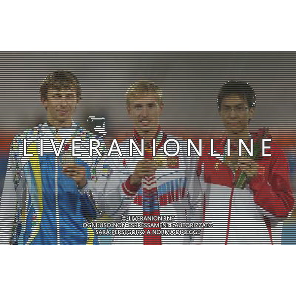 (130710) -- KAZAN, July 10, 2013 () -- Gold medalist Sergey Mudrov (C) of Russia poses with silver medalist, Ukraine\'s Andrii Protsenko (L), and bronze medalist, China\'s Wang Yu, during the awarding ceremony of men\'s High Jump at the 27th Summer Universiade in Kazan Russia, July 9, 2013. Mudrov claimed the title with 2.31 meters. (/Meng Yongmin) ©PHOTOSHOT/AGENZIA ALDO LIVERANI SAS - ITALY ONLY - EDITORIAL USE ONLY