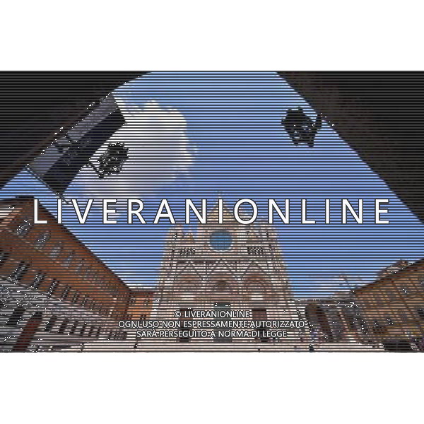 (130709) -- SIENA, July 9, 2013 () -- The Siena Cathedral is seen in the historic center of Siena, Tuscany of Italy, July 7, 2013. The historic center of Siena was inscribed onto UNESCO\'s World Heritage List in 1995. The city is famous for its medieval cityscape and the horse race Palio, attracting over 150,000 visitors every year. (/Xu Nizhi) (djj) AG ALDO LIVERANI SAS ONLY ITALY