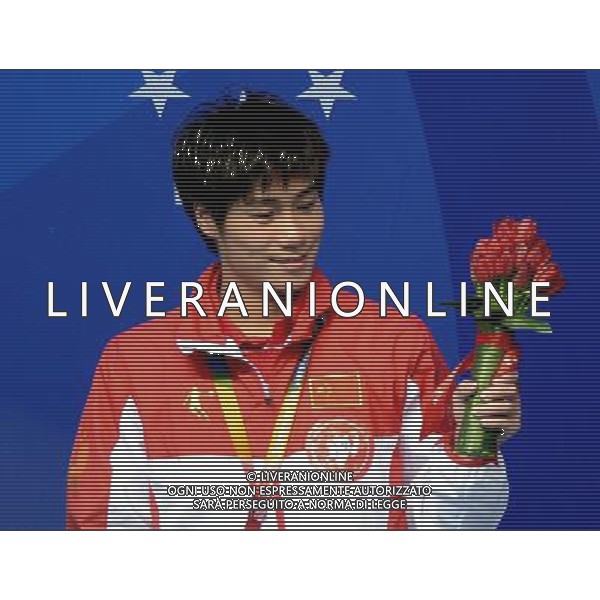 (130710) -- KAZAN, July 10, 2013 () -- Huo Liang of China celebrates during the awarding ceremony for the men\'s 10m platform diving at the 27th Summer Universiade in Kazan, Russia, July 10, 2013. Huo Liang won the gold medal with 531.25. (/Kong Hui) ©photoshot/AGENZIA ALDO LIVERANI SAS - ITALY ONLY - EDITORIAL USE ONLY