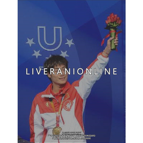 (130710) -- KAZAN, July 10, 2013 () -- Huo Liang of China greets spectators during the awarding ceremony for the men\'s 10m platform diving at the 27th Summer Universiade in Kazan, Russia, July 10, 2013. Huo Liang won the gold medal with 531.25. (/Kong Hui) ©photoshot/AGENZIA ALDO LIVERANI SAS - ITALY ONLY - EDITORIAL USE ONLY