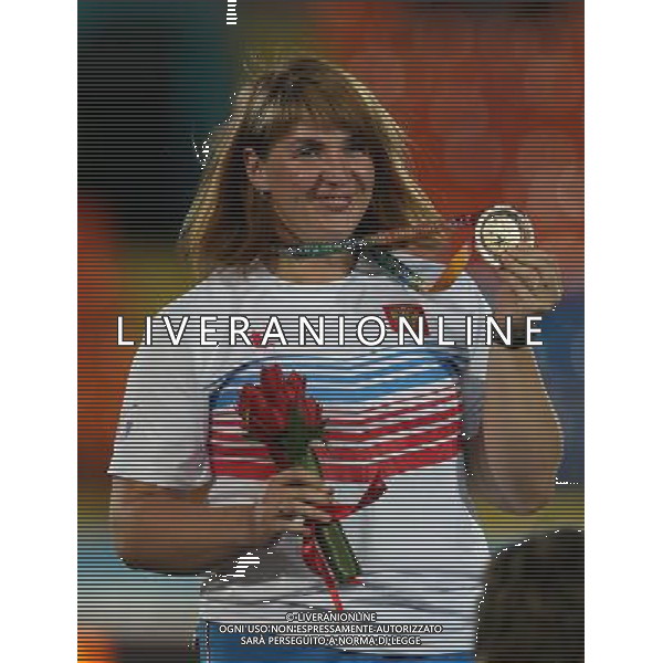 (130712) -- KAZAN, July 12, 2013 () -- Irina Tarasova of Russia poses during the awarding ceremony after the women\'s shot put final at the 27th Summer Universiade in Kazan, Russia, July 11, 2013. Tarasova won the gold medal with 18.75 meters. (/Meng Yongmin) (jyc) ©photoshot/AGENZIA ALDO LIVERANI SAS - ITALY ONLY - EDITORIAL USE ONLY