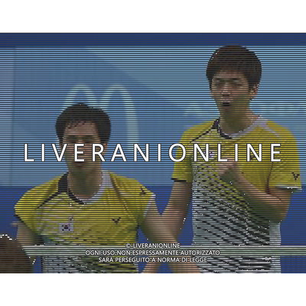 (130712) -- KAZAN, July 12, 2013 () -- Lee Yong Dae (R) and Ko Sung Hyun of South Korea celebrate during the men\'s doubles final match of badminton event against Ivan Sozonov and Vladimir Ivanov of Russia at the 27th Summer Universiade in Kazan, Russia, July 11, 2013. Lee Yong Dae and Ko Sung Hyun won the gold medal with 3-0. (/Kong Hui) (jyc) ©photoshot/AGENZIA ALDO LIVERANI SAS - ITALY ONLY - EDITORIAL USE ONLY