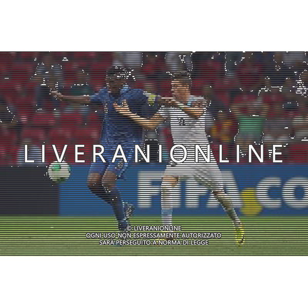 FIFA U20 World Cup Final match between France and Uruguay at Turk Telekom Arena Stadium in Istanbul, Turkey 13.07.2013 Pictured: Paul Pogba (6) of France and Jose Gimenez (19) of Uruguay. MISTRZOSTWA SWIATA U20 U 20 PILKA NOZNA TURCJA FINAL FRANCJA vs URUGWAJ FOT. SESKIM/NEWSPIX.PL TURKEY, GERMANY, AUSTRIA AND UK OUT !!! --- Newspix.pl AG ALDO LIVERANI SAS ONLY ITALY *** Local Caption *** www.newspix.pl mail us: info@newspix.pl call us: 0048 022 23 22 222 --- Polish Picture Agency by Ringier Axel Springer Poland