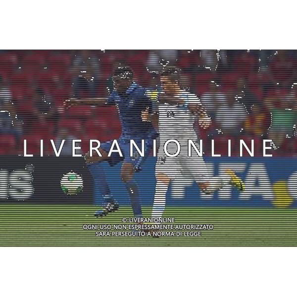 FIFA U20 World Cup Final match between France and Uruguay at Turk Telekom Arena Stadium in Istanbul, Turkey 13.07.2013 Pictured: Paul Pogba (6) of France and Jose Gimenez (19) of Uruguay. MISTRZOSTWA SWIATA U20 U 20 PILKA NOZNA TURCJA FINAL FRANCJA vs URUGWAJ FOT. SESKIM/NEWSPIX.PL TURKEY, GERMANY, AUSTRIA AND UK OUT !!! --- Newspix.pl AG ALDO LIVERANI SAS ONLY ITALY *** Local Caption *** www.newspix.pl mail us: info@newspix.pl call us: 0048 022 23 22 222 --- Polish Picture Agency by Ringier Axel Springer Poland