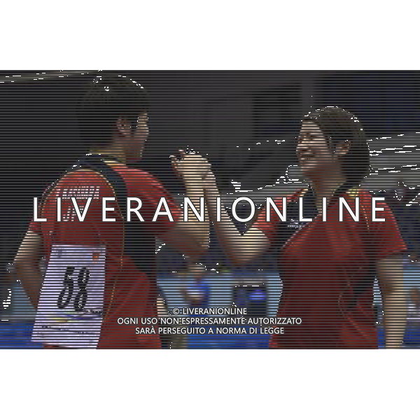 (130714) -- KAZAN, July 14, 2013 () -- Hiromitsu Kasahara (L) and Rika Suzuki of Japan celebrate victory after the table tennis mixed doubles semifinal match against Xia Yizheng and Ma Yuefei of China at the 27th Summer Universiade in Kazan, Russia, July 13, 2013. Hiromitsu Kasahara and Rika Suzuki won 4-2. (/Kong Hui) (jyc) ©PHOTOSHOT/AGENZIA ALDO LIVERANI SAS - ITALY ONLY - EDITORIAL USE ONLY